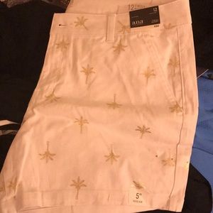 White Shorts With Gold Accents
